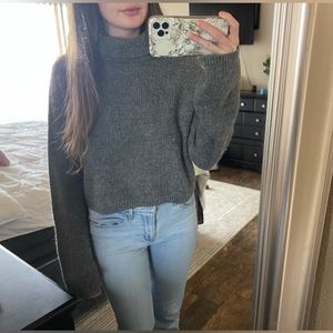 Grey, loose turtleneck sweater